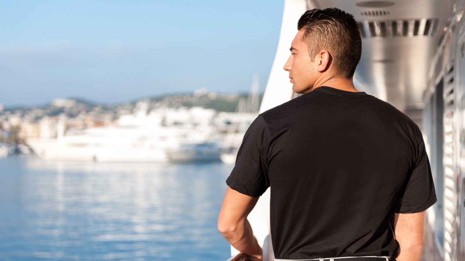 Yacht crew member at sea